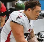  ?? CURTIS COMPTON/CURTIS.COMPTON@AJC.COM ?? Jalen Mayfield, a third-round pick from Michigan, struggled at left guard Sunday against the Eagles. He had two false-start penalties and gave up at least one sack. “I have to do everything better,” he said.