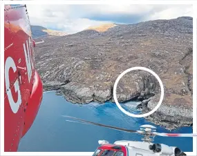  ??  ?? Coastguard helicopter photos show the cliff where Andy slipped while walking on the Isle of Lewis