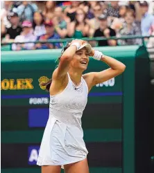  ?? ALBERTO PEZZALI/ASSOCIATED PRESS ?? Britain’s Emma Raducanu celebrates after defeating Romania’s Sorana Cirstea 6-3, 7-5 in a Wimbledon third-round women’s singles match on Saturday.