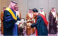  ?? SPA ?? Above: Crown Prince Mohammed bin Salman received an honorary doctorate from Kasetsart University in Bangkok during his visit.