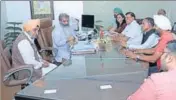  ?? HT PHOTO ?? Punjab food, civil supplies and consumer affairs minister Bharat Bhushan Ashu and rural developmen­t and panchayats minister Tript Rajinder Singh Bajwa at a meeting with rice millers on Wednesday.