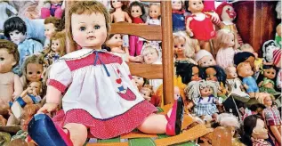  ??  ?? Faces of many sizes, shapes and colors make up Imogene McDowell’s doll collection.