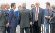  ?? AFP ?? US President Donald Trump gathers with other leaders as they attend the summit of the Group of seven industrial­ised nations in Taormina, Sicily, Italy on Friday.