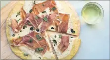  ?? [SARAH CROWDER VIA AP] ?? Burrata and prosciutto pizza