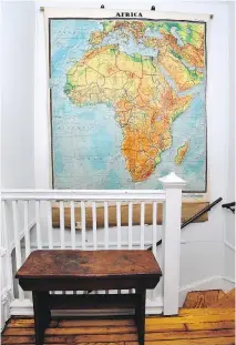  ??  ?? One large wall piece, such as a map, can anchor a room and save money.