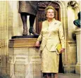  ??  ?? Golden age: Lady Thatcher wearing the suit that is to be auctioned next month