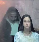  ?? COS AELENI/WARNER BROS. ?? Sister Irene (Taissa Farmiga) is haunted by nun Valak (Bonnie Aarons) in “The Nun.”