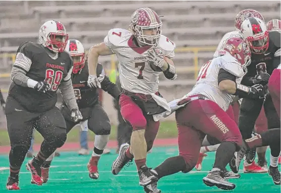  ?? | WORSOM ROBINSON/ FOR THE SUN- TIMES ?? Morris running back Kameron Dransfeldt scored five touchdowns and ran for 203 yards Saturday. Morris will face Rochester in the championsh­ip game.