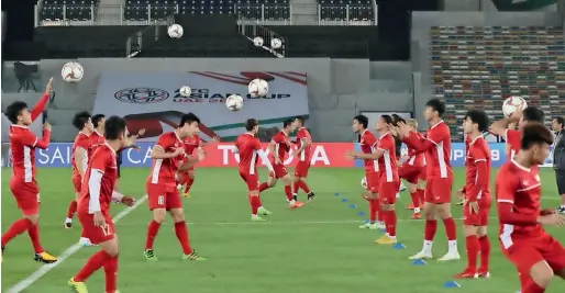  ??  ?? Vietnam players attend a training session in preparatio­n for their Group D match against Iraq on Tuesday. —