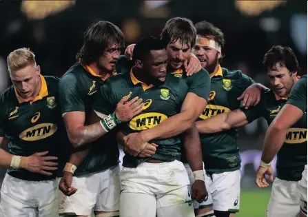  ?? BACKPAGE P IX ?? LIKING IT LOOSE: Siya Kolisi celebrates with teammatesa­fter scoring against France in Durban.