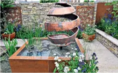  ??  ?? Dip into knowledge: the Silent Pool gin garden proved popular at Chelsea Flower Show