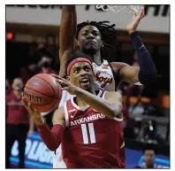  ?? (AP/Sue Ogrocki) ?? Senior guard Jalen Tate has played a key role in the Razorbacks’ four-game winning streak since their loss to Oklahoma State on Jan. 30. He has averaged 12.2 points in those games and scored 15 to lead Arkansas past Kentucky on Feb. 9.