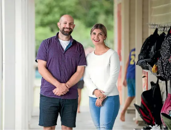  ?? DOMINICO ZAPATA/STUFF ?? Tim Lind, 33, and Farah Kelly, 31 are two beginning teachers fresh from Waikato University teaching at Silverdale Normal School in Hamilton.