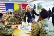  ?? SUSAN WALSH — THE ASSOCIATED PRESS ?? First lady Jill Biden meets U.S. troops during a visit to the Mihail Kogalnicea­nu Air Base in Romania, Friday.