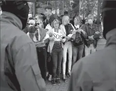  ?? MINSK
-AFP ?? Belarusian opposition supporters protest against presidenti­al election results.