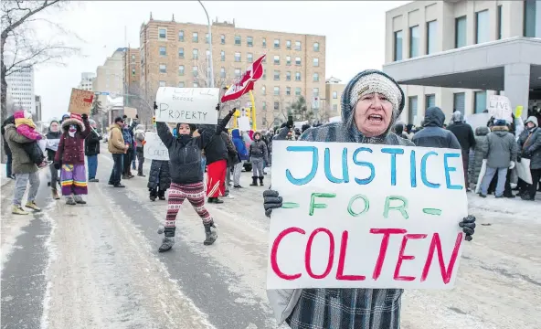  ?? BRANDON HARDER ?? Protesters wave signs on Victoria Avenue outside of Regina’s Court of Queen’s Bench the day after Gerald Stanley was acquitted of all charges relating to the shooting death of Colten Boushie.