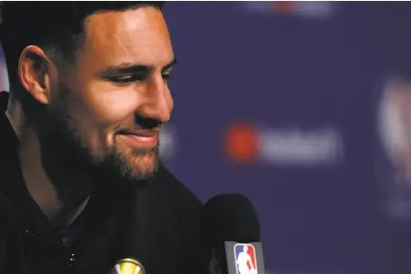  ?? Carlos Avila Gonzalez / The Chronicle ?? Klay Thompson, smiling during Sunday’s media availabili­ty, has averaged 21.2 points in nine eliminatio­n games in his career.