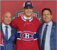  ?? The Canadian Press ?? Juraj Slafkovsky poses for photos after being selected as the top pick in the first round of the NHL draft by the Montreal Canadiens.