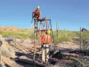  ?? MARICOPA COUNTY SHERIFF’S OFFICE/AP ?? A Maricopa County Mountain Rescue team prepares to rescue a gold prospector who fell into an abandoned mine shaft near Aguila, Ariz. earlier this week.