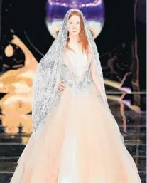  ?? YOLANCRIS BRIDAL COLLECTION ?? Romantic and daring were among the themes at the show, along with large ballroom gowns, as shown in the creation by in this YolanCris.