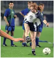  ??  ?? Red hot: Mick Hucknall fires past Walsh in training PA