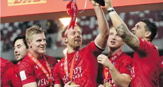  ?? GETTY IMAGES ?? Coach Damian McGrath says members of the Canadian men’s rugby sevens squad “realize they can consistent­ly play with the big boys” after winning their first World Series event last month in Singapore.