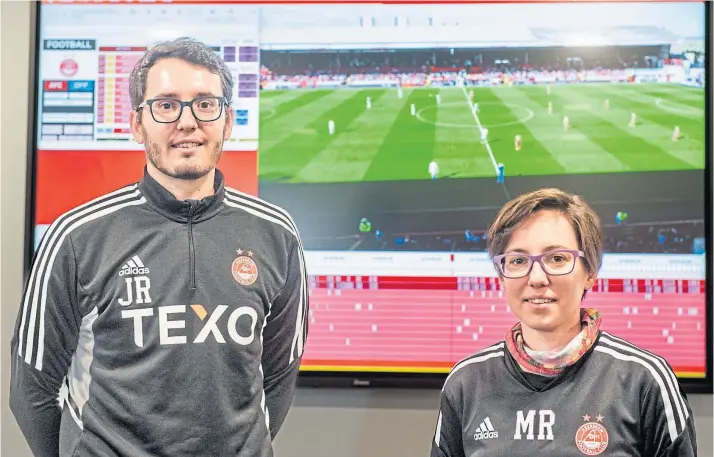  ?? ?? STATS THE WAY TO DO IT: Aberdeen FC performanc­e analysis team, brother and sister Jordi and Marta Rams, at Cormack Park. Picture by Kami Thomson.