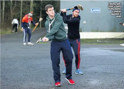  ??  ?? Taking aim: Clare’s Tony Kelly pucks a sliotar against a
wall