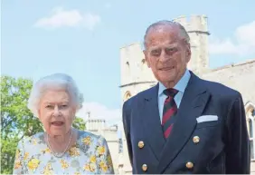  ?? STEVE PARSONS/AP FILE ?? Queen Elizabeth II and Prince Philip, the Duke of Edinburgh, went public with news of their vaccinatio­ns to dispel speculatio­n.