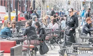  ?? DAVID COOPER TORONTO STAR FILE PHOTO ?? If a restaurant wants to convert an on-street parking space into a patio, the city requires it to pay $1,235.09 per month to offset parking revenue the space would have generated.