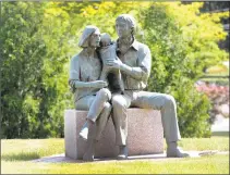  ?? Carol Kaliff / Hearst Connecticu­t Media ?? “Danbury Family,” a bronze sculpture by artist Penelope Jencks, sits at the front entrance of the state Superior Court in Danbury.