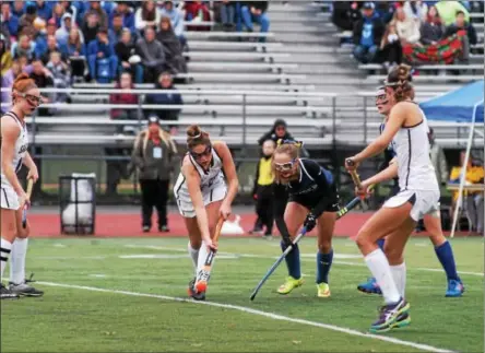  ?? JOHN BREWER - ONEIDA DAILY DISPATCH ?? Camden’s Mackenzie Mix and Burnt Hills’ Deidre Rafferty vie for possession during Sunday’s field hockey regional.