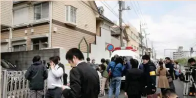  ??  ?? Reporters gathered outside the suspect’s home on Tuesday