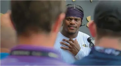  ?? KARL MERTON FERRON/BALTIMORE SUN ?? The Ravens have until July 17 to negotiate an extension with quarterbac­k Lamar Jackson, pictured July 28, who might have a better sense of his market after next week.