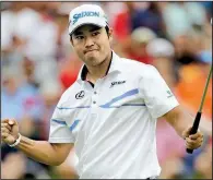  ?? AP/TONY DEJAK ?? Hideki Matsuyama celebrates his victory Sunday at the WGC-Bridgeston­e Invitation­al with a birdie on the 18th hole.