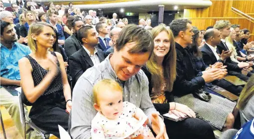  ?? PHOTO: KERRIE WATERWORTH ?? All in the family . . . Ashley Bolt and Kendall Smith, formerly of England, made it a family affair yesterday when they became New Zealand citizens carrying their New Zealandbor­n daughter Tilly (9 months).