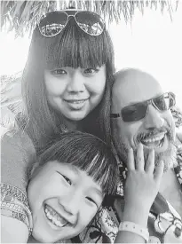  ?? SUBMITTED ?? Monte Gisborne of Montague is pictured with his wife and step-daughter on vacation in 2018. At the moment, his wife, Daniela, and step-daughter, Dominica, are healthy but trapped in Wuhan where the coronaviru­s has killed nearly 500 people and infected more than 24,000 others.