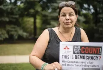  ?? BRIAN B. BETTENCOUR­T/TORONTO STAR ?? Kelly Carmichael, executive director of Fair Vote Canada, wants an end to the first-past-the post voting system.