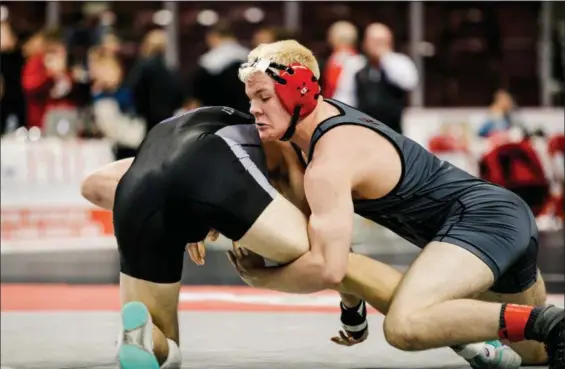  ?? NATE HECKENBERG­ER - FOR MEDIANEWS GROUP ?? Alan Alexander of Boyertown tries to cradle Mifflin County’s Jacob Krepps on his way to an 8-3 win at 170 pounds.