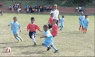  ??  ?? Action from the Ravi Govender Memorial Junior KO Cup under7 final between Dimes United and Summerfiel­d Dynamos which was won 2-0 by Summerfiel­d in Chatsworth recently.