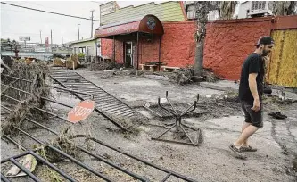  ?? Kin Man Hui/staff photograph­er ?? Destroyed by catastroph­ic floods, the Leon Valley City Council voted to tear down the abandoned Comfort Café after multiple attempts to reach the property’s owner went unanswered.