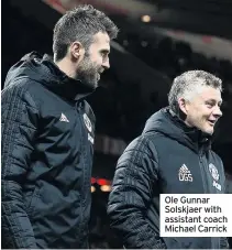 ??  ?? Ole Gunnar Solskjaer with assistant coach Michael Carrick