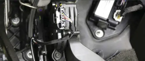  ??  ?? The installati­on of an Amp’d throttle box couldn’t be any simpler, with just one major connection needing to be made. Mounted directly to the throttle pedal under the dash, you just need to disconnect the factory pedal harness and plug in the supplied harness in the Edge package. One end will plug into the pedal and the other into the factory wire harness.