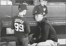  ?? GREGORY STRONG/AP ?? NINE-YEAR-OLD DEREK RODRIGUEZ meets New York Yankees’ Aaron Judge in the dugout on Wednesday before the Yankees’ game against the Toronto Blue Jays in Toronto.