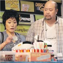  ?? CYLLA VON TIEDEMANN ?? Jean Yoon and Paul Sun-Hyung Lee play a couple who run a shop in the sitcom and stage versions of Kim’s Convenienc­e.