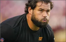  ?? (AP/Andrew Harnik) ?? Washington Commanders guard Sam Cosmi starts his recovery regimen almost immediatel­y after the game. Following a day game at FedEx Field, he heads to the team’s training facility in Ashburn, Va., to start cold-water therapy. Such baths don’t reduce soreness, but help with inflammati­on.