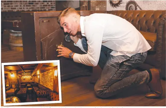  ?? Picture: TERTIUS PICKARD ?? Tipsy Pig assistant manager and owner Craig Duffy’s son Kalvin has a crack at the mystery safe in the new Surfers Paradise venue.