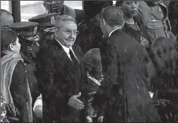  ?? AP ?? THE HANDSHAKE between Cuba’s Raul Castro and President Obama.