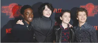  ??  ?? STRANGER THINGS cast members (L-R) Caleb McLaughlin, Finn Wolfhard, Noah Schnapp and Gaten Matarazzo pose at the premiere for the second season of the television series in Los Angeles, California on Oct. 26.