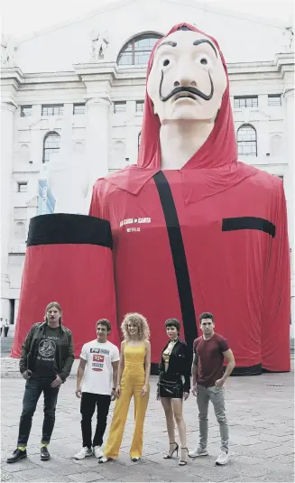  ?? PICTURE: VITTORIO ZUNINO CELOTTO/GETTY IMAGES ?? TEAMWORK: Some of the cast member of the award-winning Spanish thriller Money Heist at an event in Milan last summer.